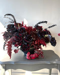Black Rose Floral Arrangement with Burgundy Accents