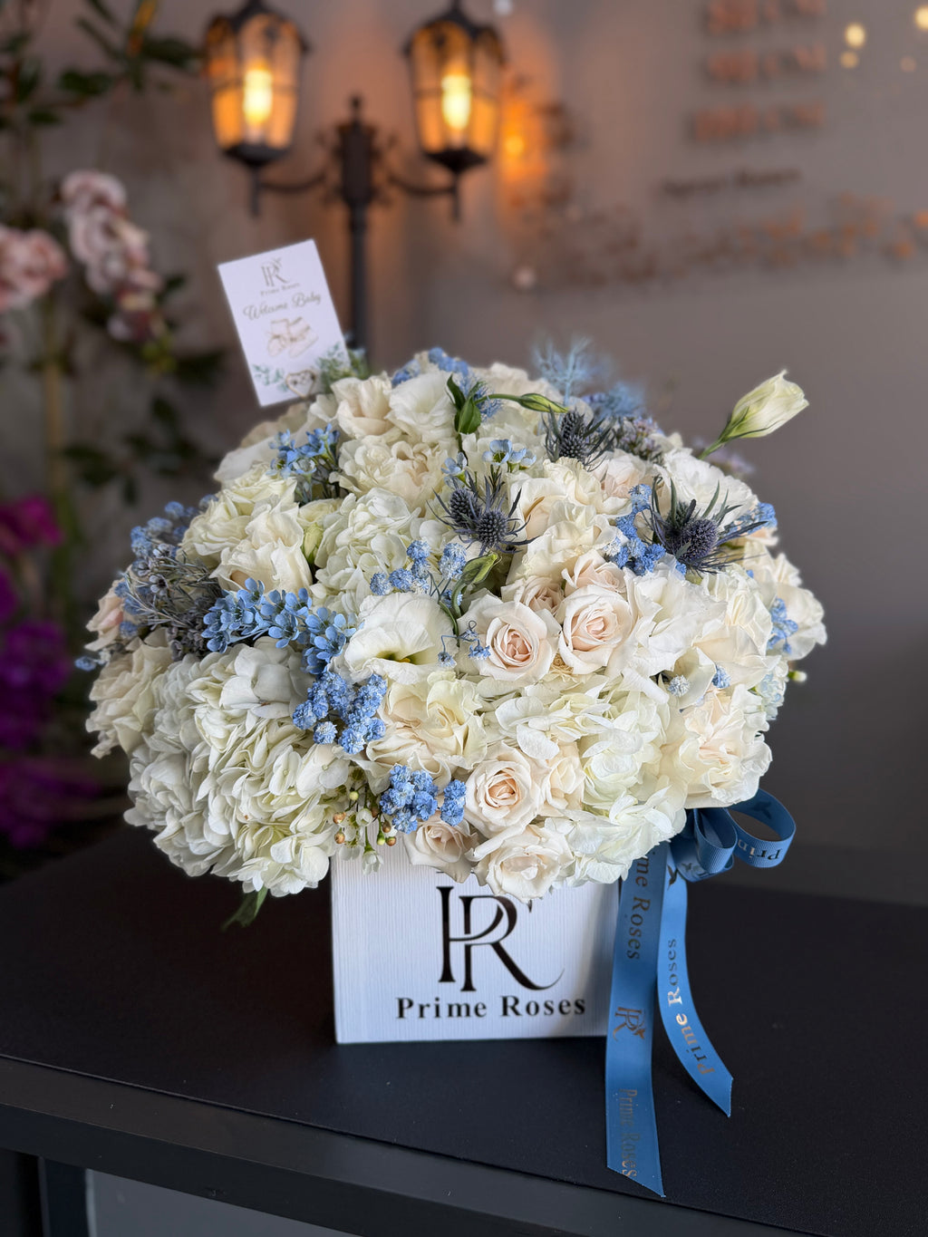 Welcome Baby Boy Floral Arrangement in White and Blue