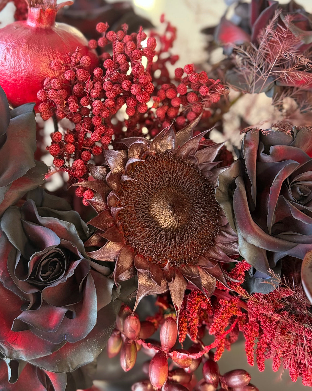 Black Rose Floral Arrangement with Burgundy Accents