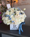 Welcome Baby Boy Floral Arrangement in White and Blue
